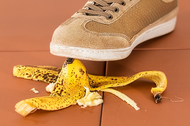 shoe stepping on banana peel and risking a fall
