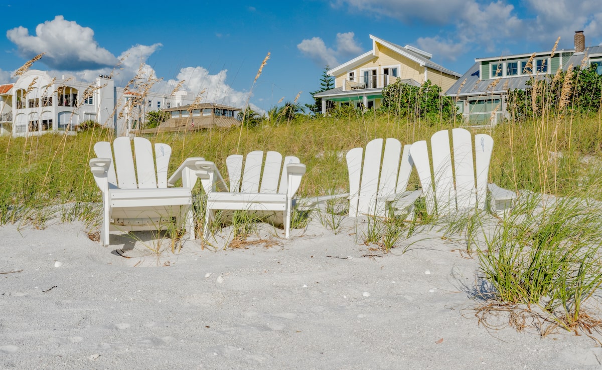 Beach vacation homes and beach chairs
