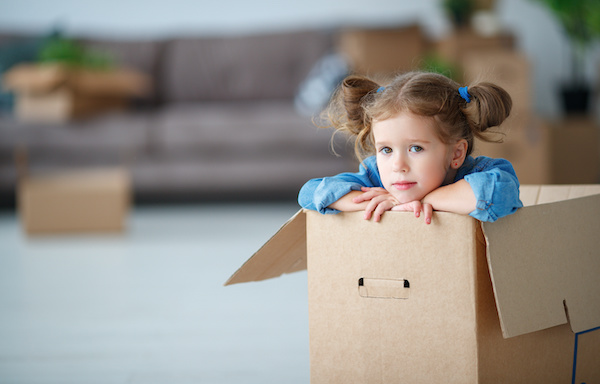 Child in moving box