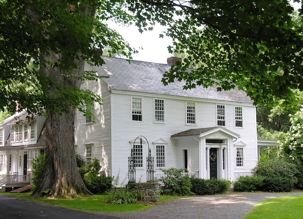 Modern, white Colonial house