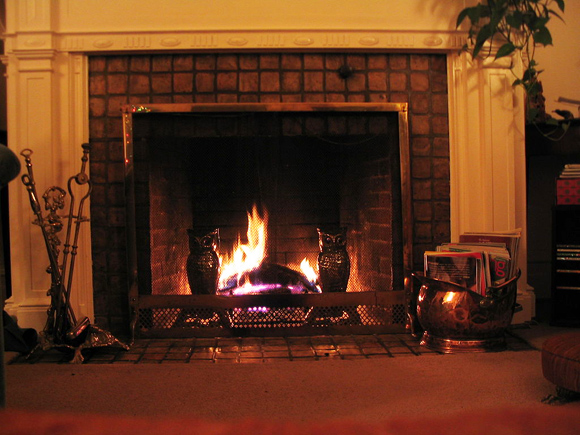 Christmas_tree_and_stocking_hung_over_fireplace