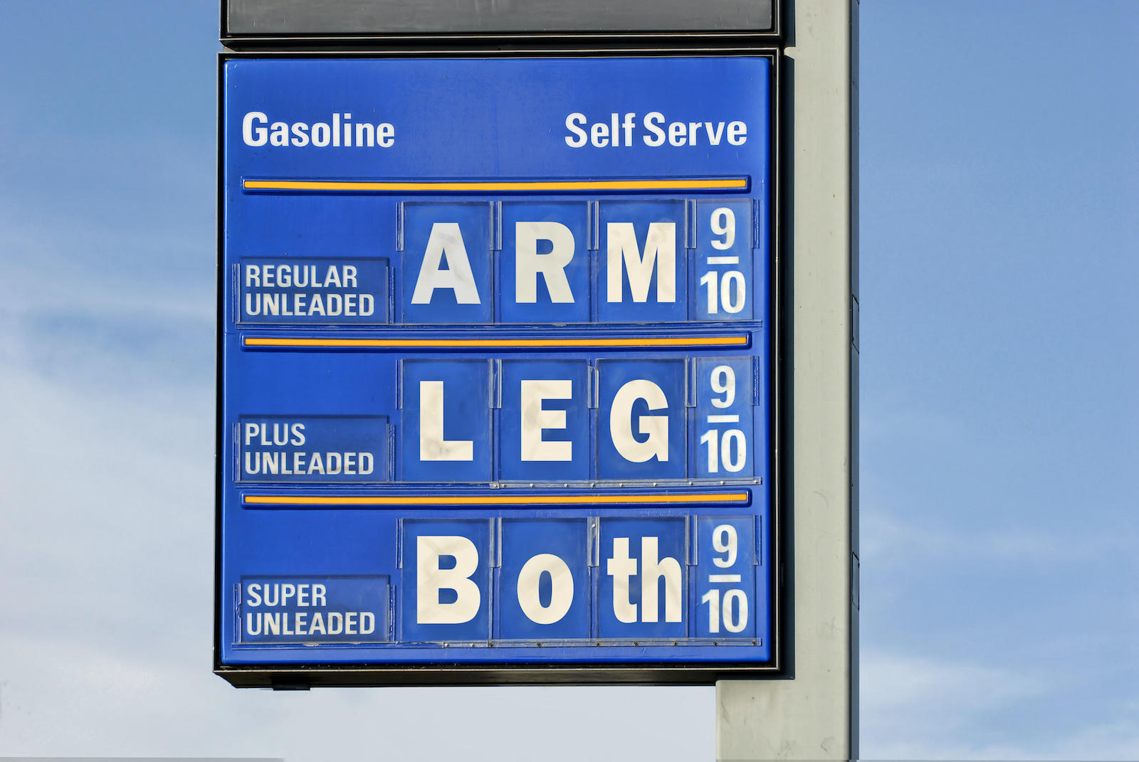 Lumber prices and gas station price sign