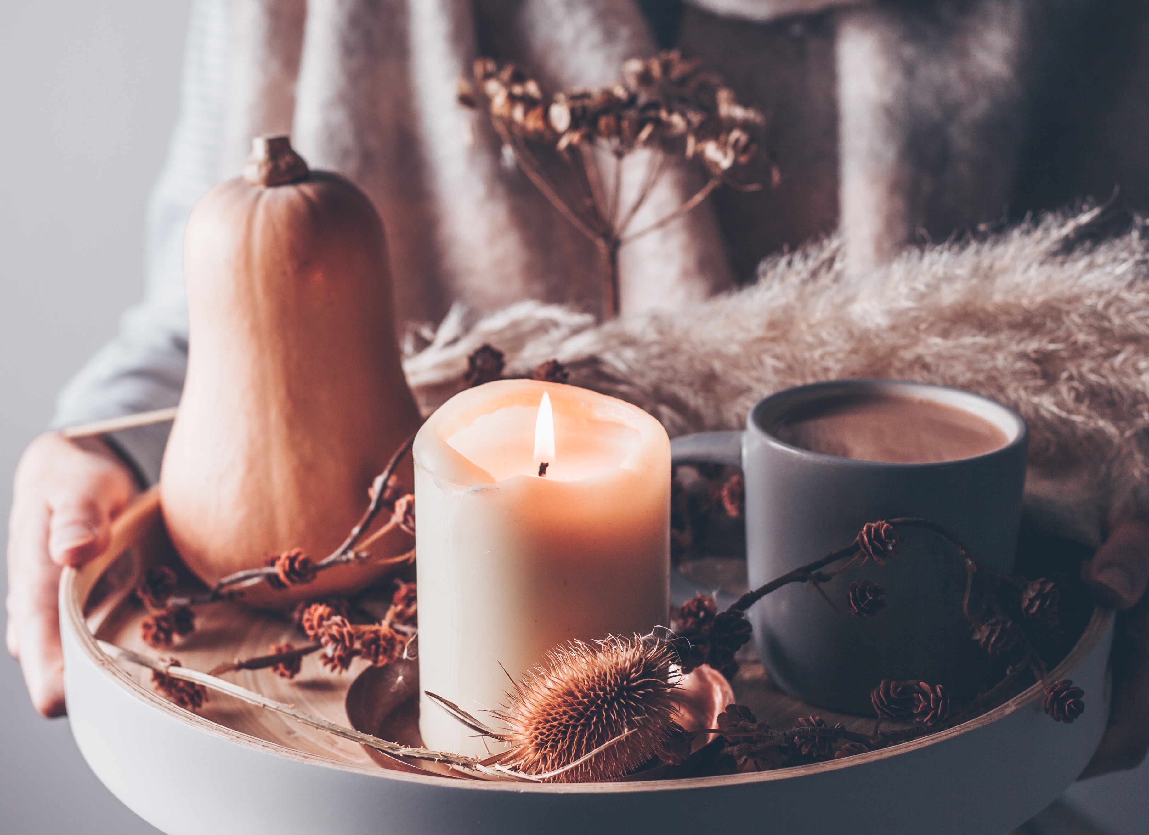 Gourd, candle, wheat on tray
