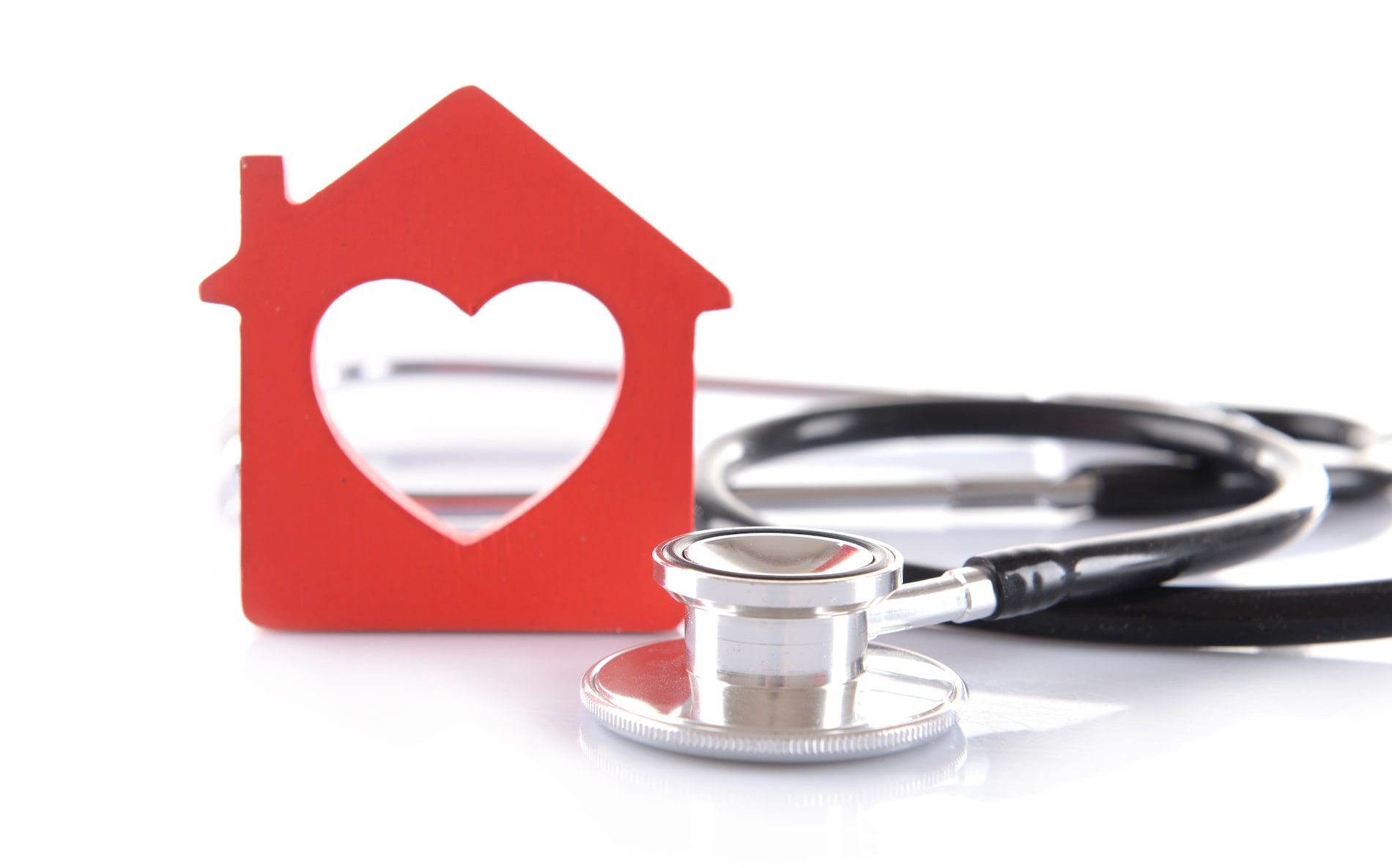 Red house and stethoscope 