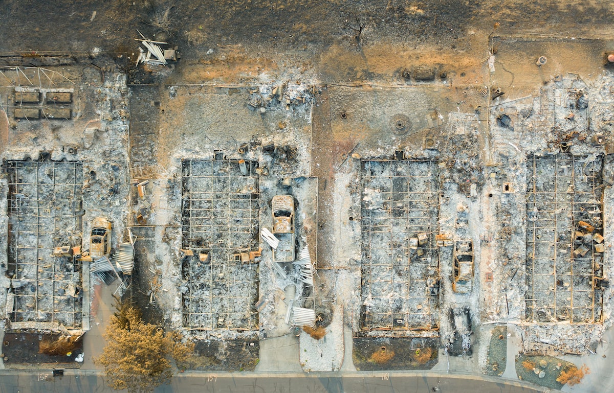 Foundations of houses decimated by wildfire