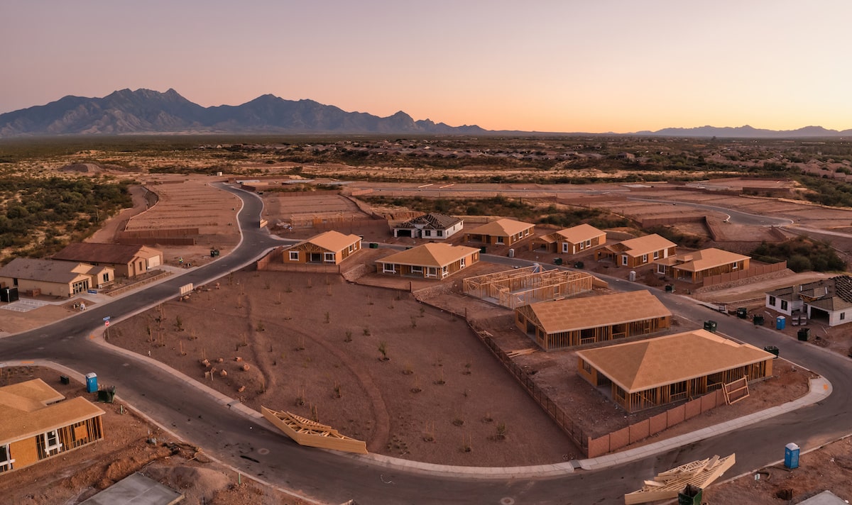 Aerial view of Arizona houses under construction in suburban subdivision