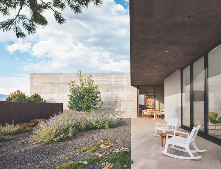2019 Professional Builder Design Awards Gold Custom Home exterior with concrete overhang for shade