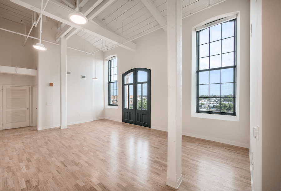 Apartment living room in the A & Indiana, a warehouse adaptive reuse project that is a 2023 BALA winner 