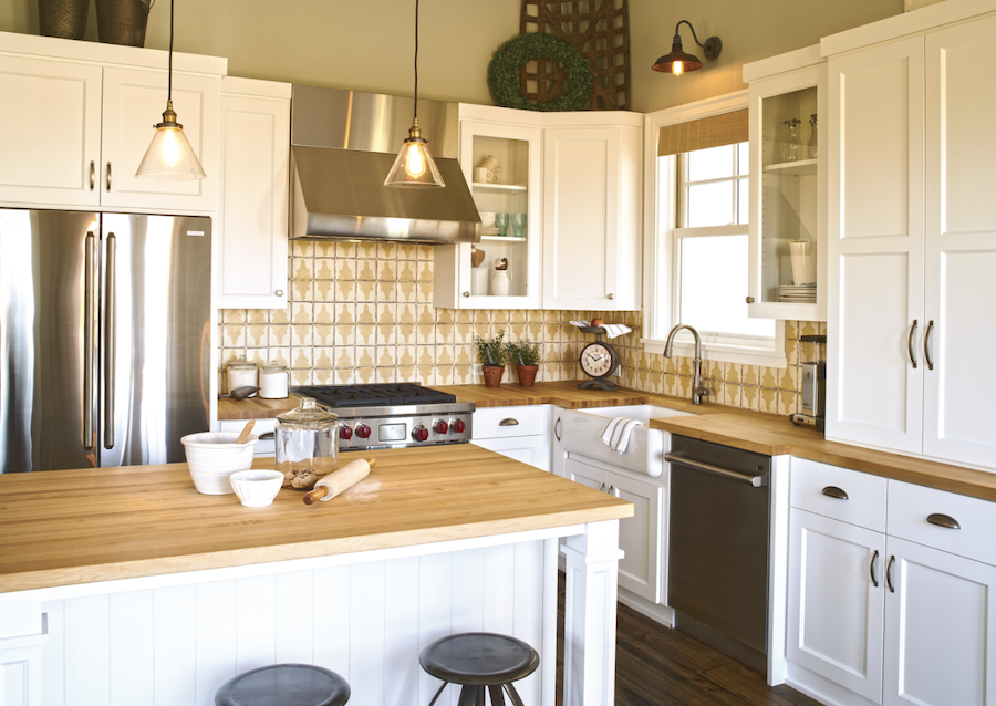 Ann Sacks tile in a carriage house kitchen by Street of Dreams, in Portland, Ore.,