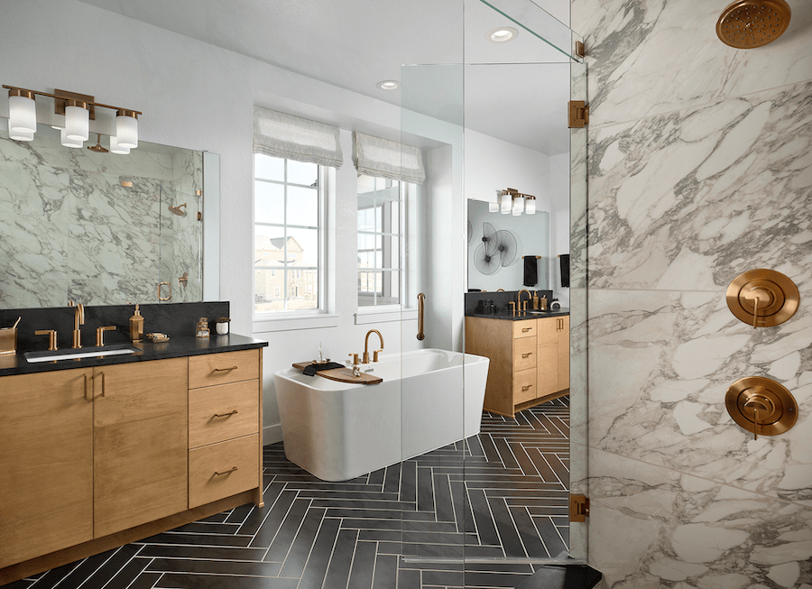 Primary bathroom in DTJ Design's luxury production home, 6150 at Westerly