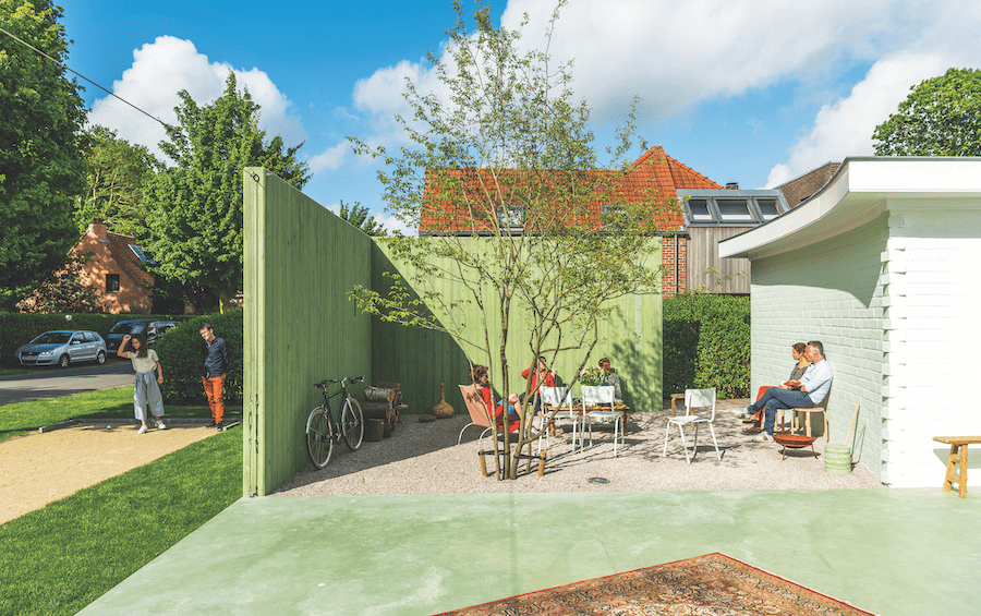 Sunny outdoor living space at the G-Lab house in Bruges, Belgium
