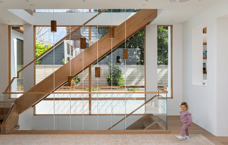 Luminosa custom home glass and timber staircase