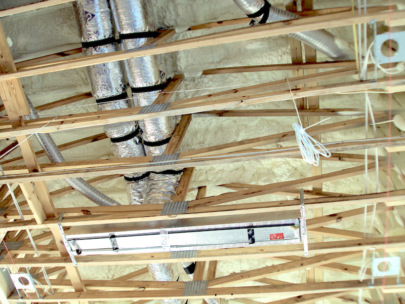 The New American Home 2021 attic insulation and mechanical rough