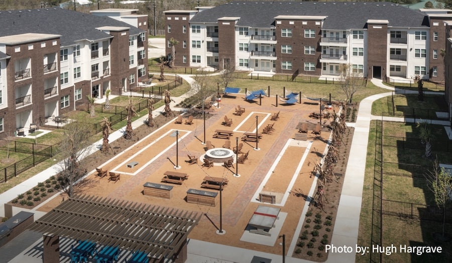 Outdoor common space in multifamily housing development