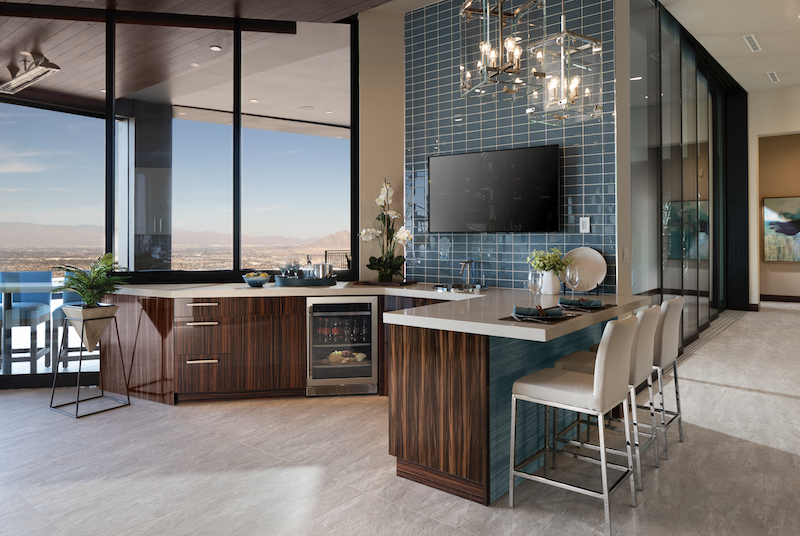 The New American Home wet bar with TV and Las Vegas views