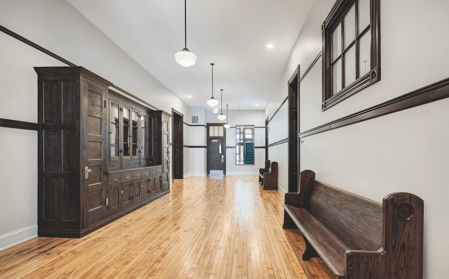 Second-floor hall in the Peabody School Apartments adaptive reuse project, a 2023 BALA winner