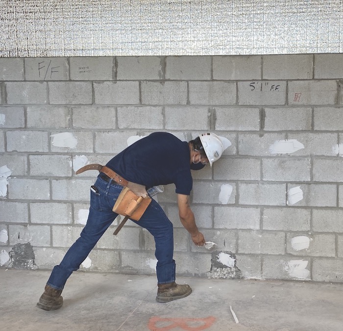 Insulating the walls of The New American Home 2021