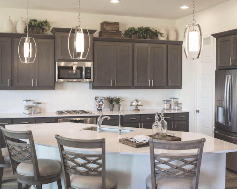 in Trendmaker Homes' design at Rancho Sienna, the kitchen offers Texas Hill Country charm 