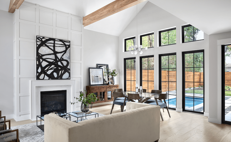 Living room view to the pool in a modern farmhouse-style home in Austin, Texas