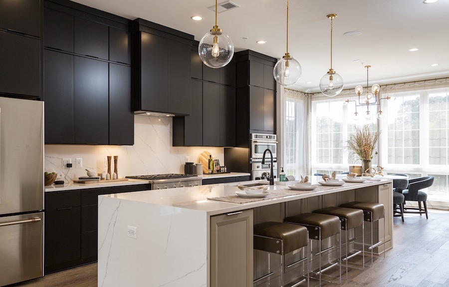 Plan 1 kitchen in the Valley & Park townhomes, a 2020 BALA winner
