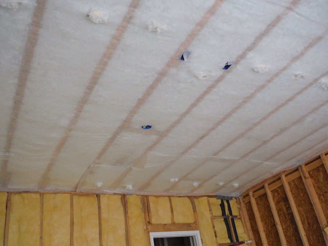 Net and blow floor joist insulation