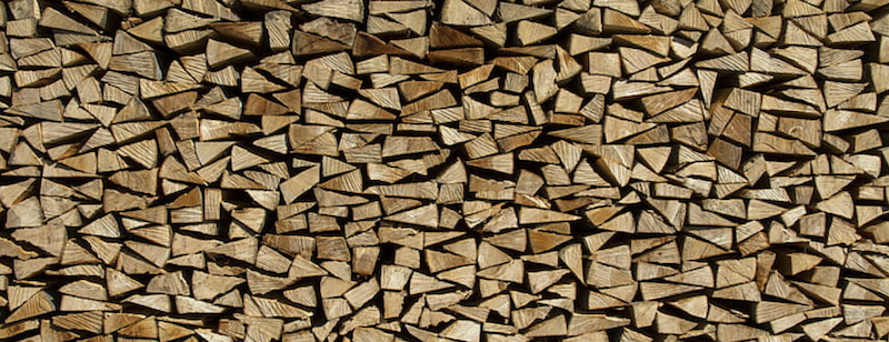 stacked firewood for burning in a fireplace