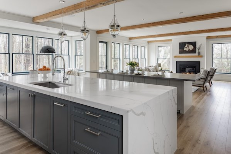 Kitchen and living space in Green Phoenix Development's LEED Platinum farmhouse renovation