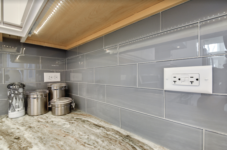 Undercabinet LED lighting in Sebring Design Build's kitchen design