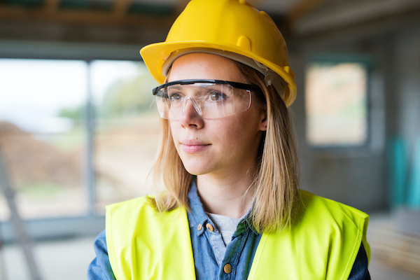 woman looking determined at construction site