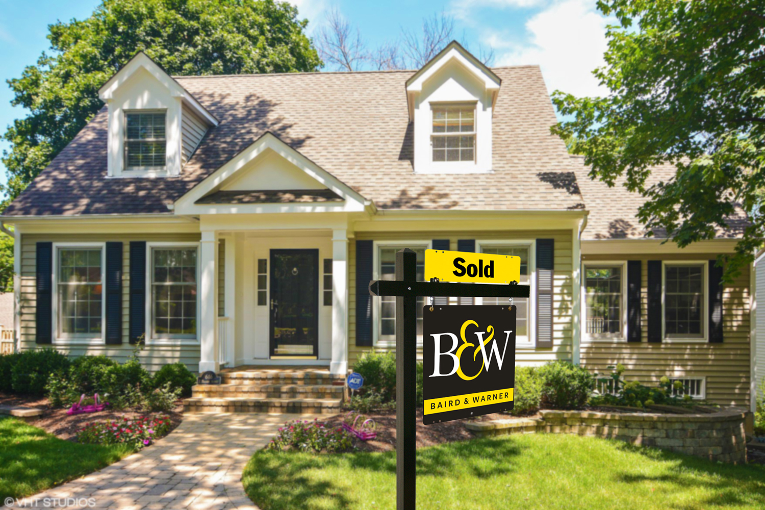 Sold home sign from Baird & Warner