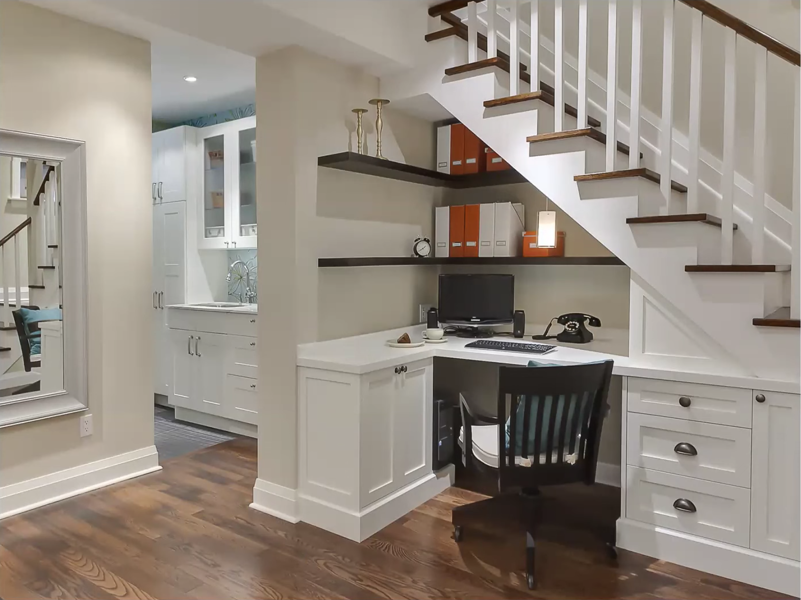 Home office desk built underneath main staircase
