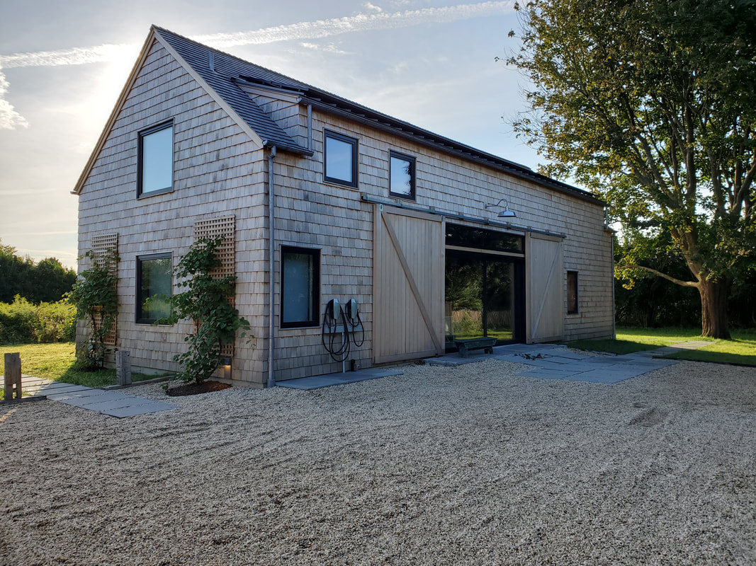 John Barrows of P3 Builder Group used passive house technology to build this ultra energy-efficient home, which also has two Tesla charging stations. Photo courtesy John Barrows