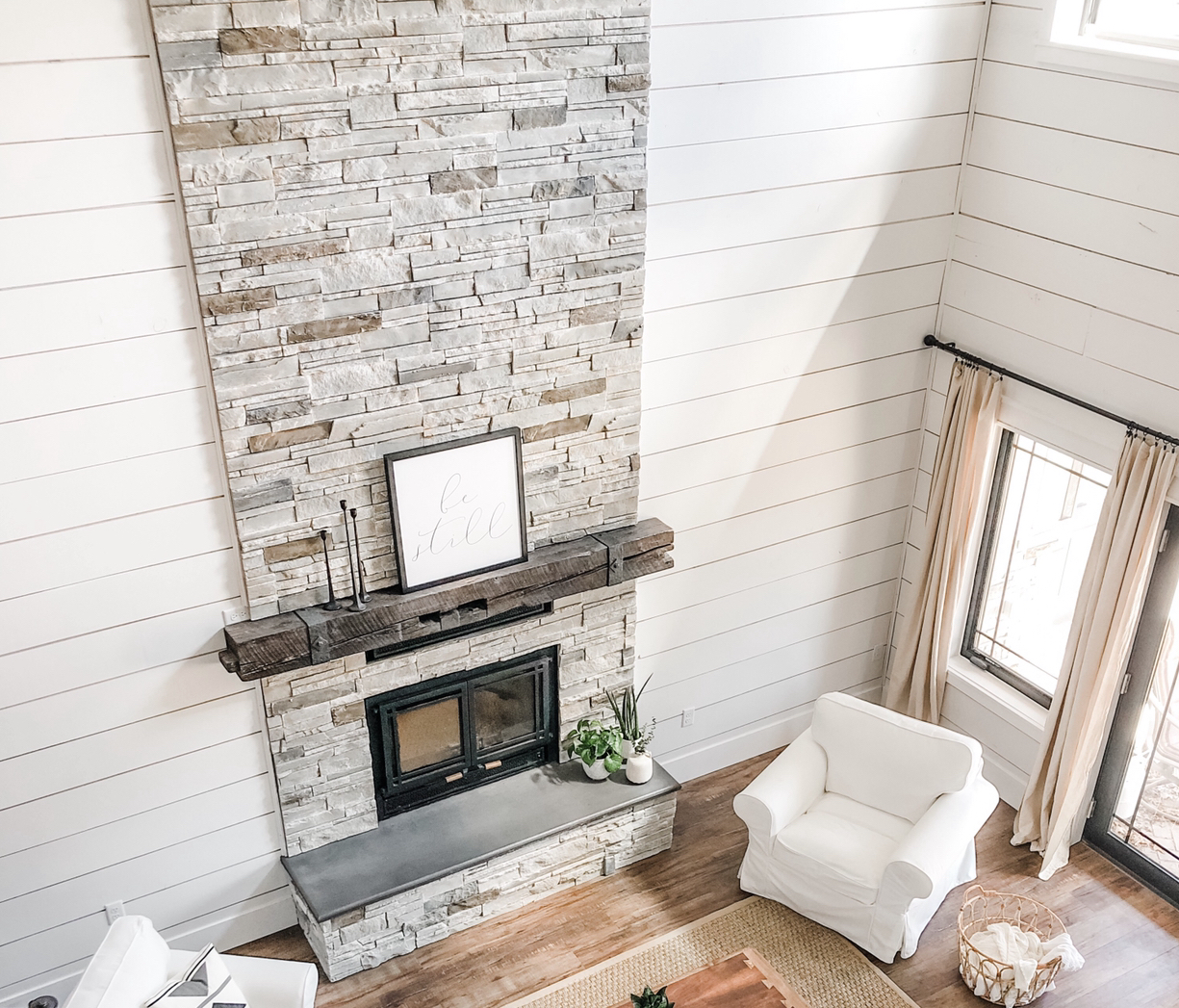 Fireplace surround made with Versetta Stone in the Ledgestone profile and Mission Point colorway.