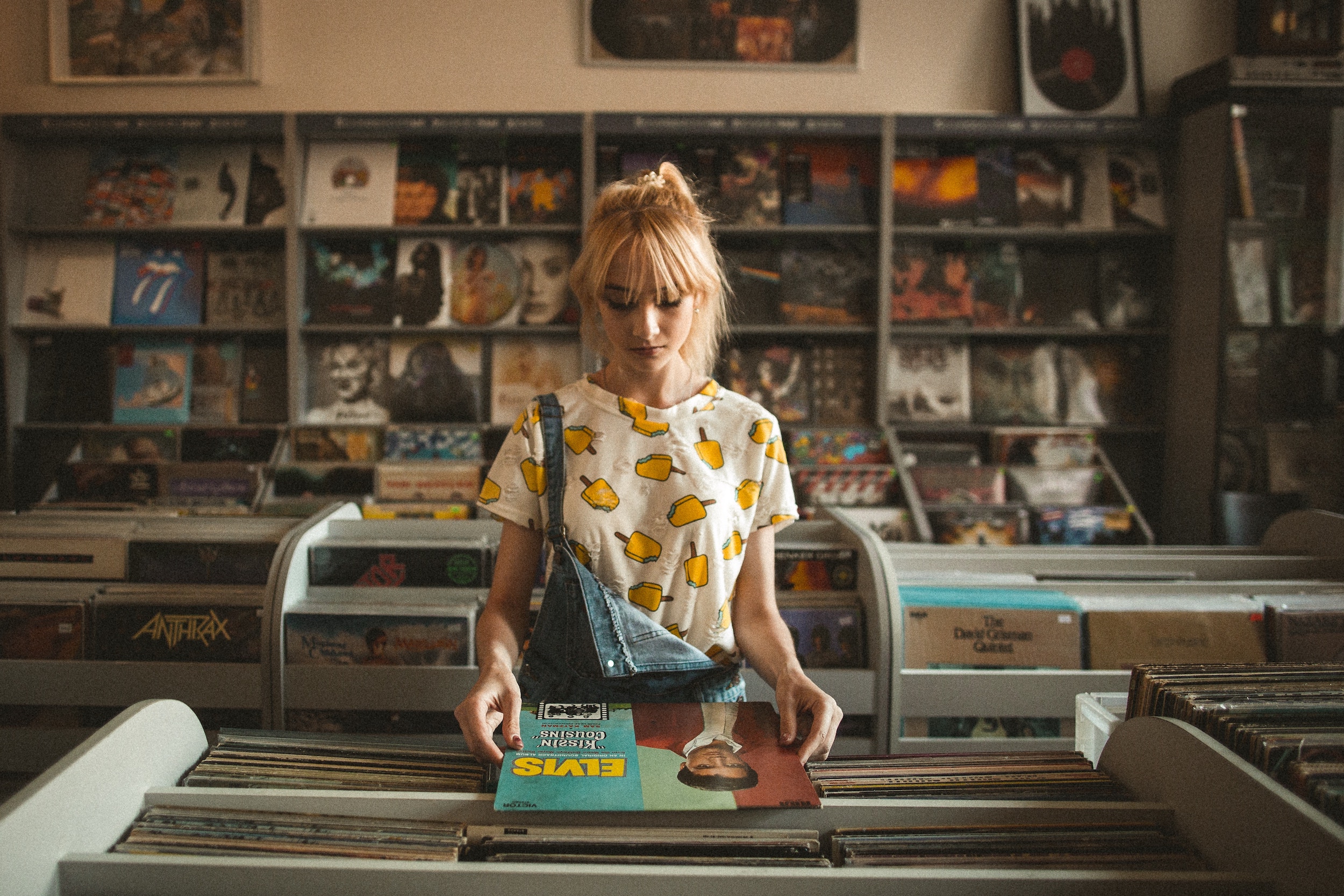 Woman at a record store