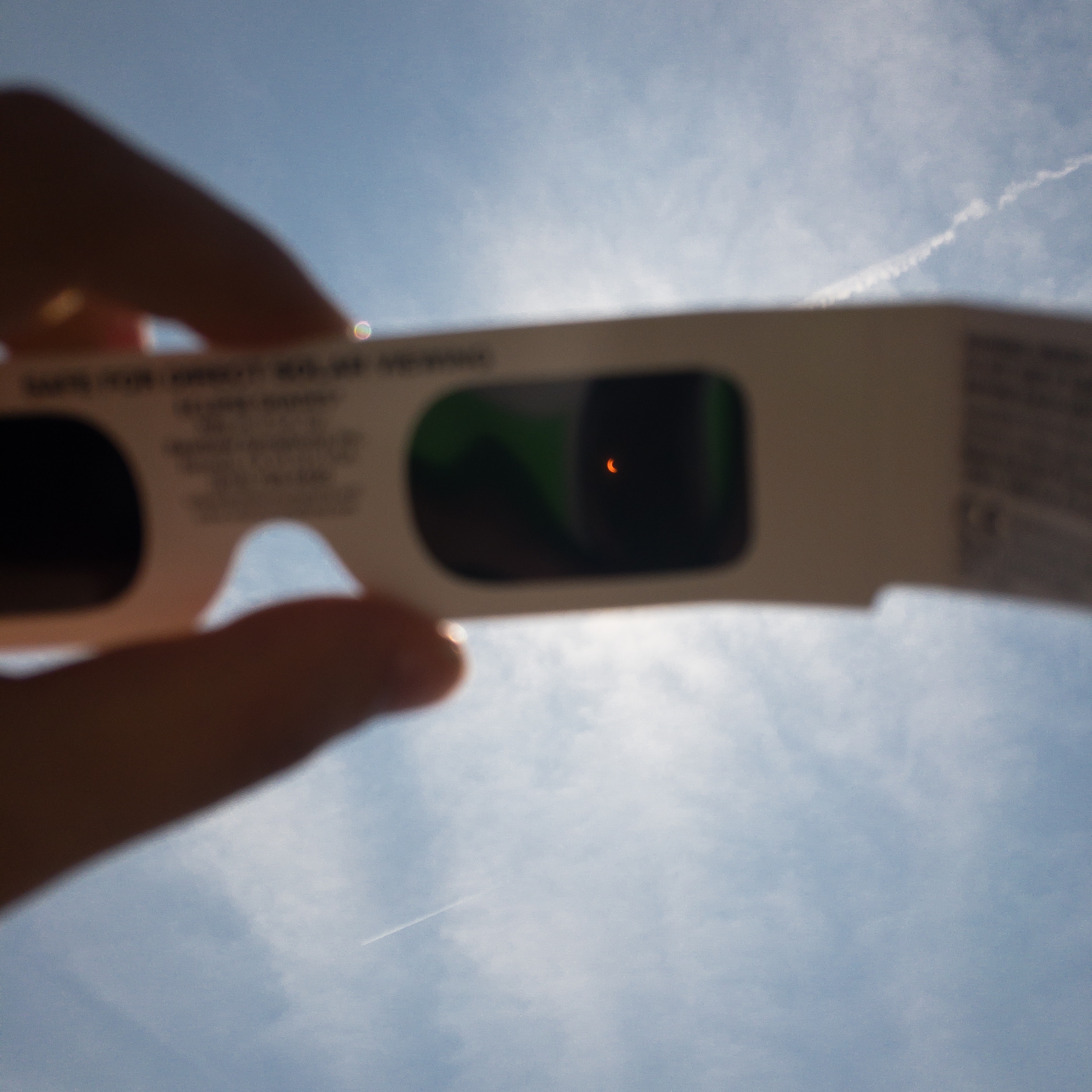 Solar glasses looking at solar eclipse