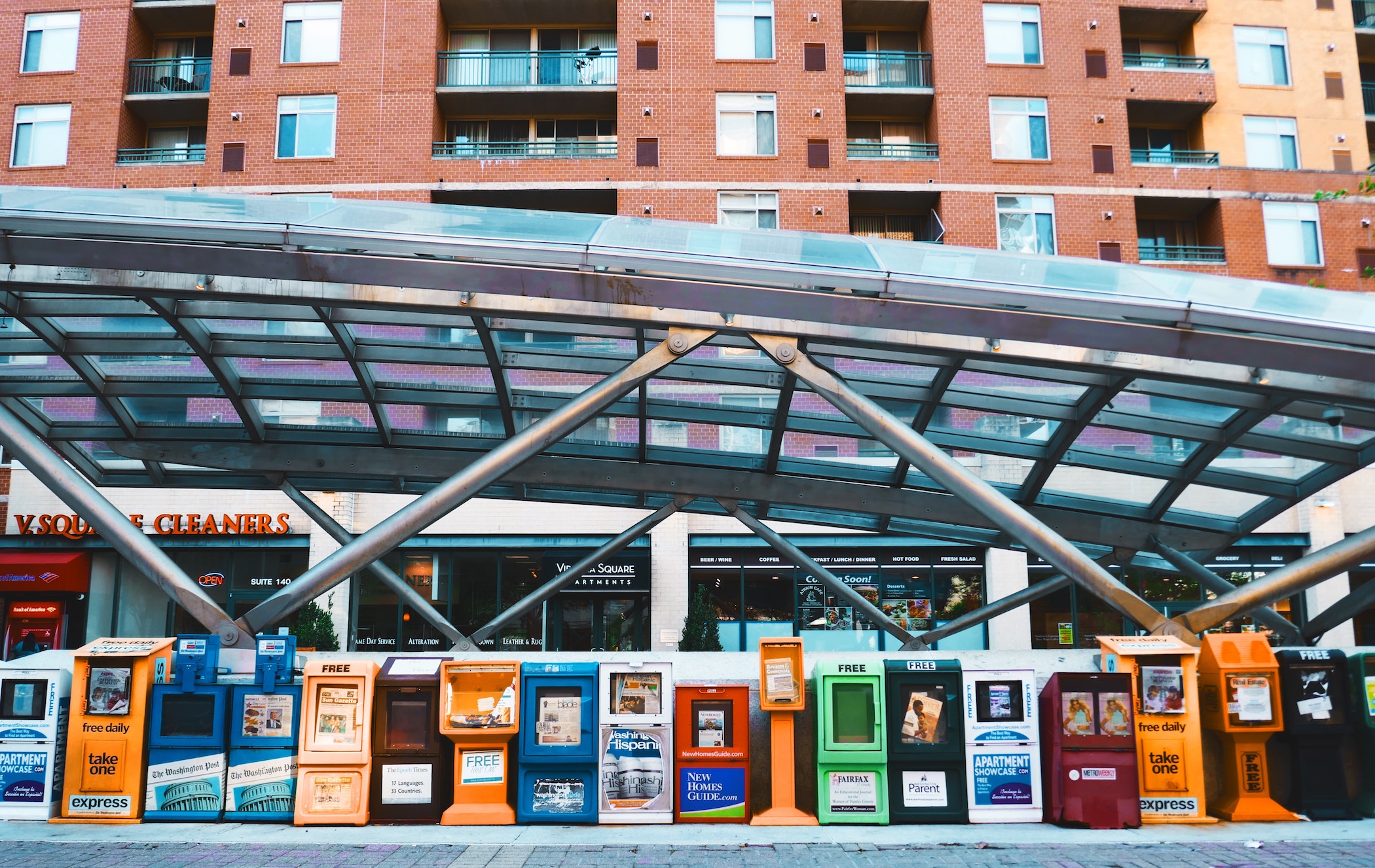 Newspaper vending units at a transit station