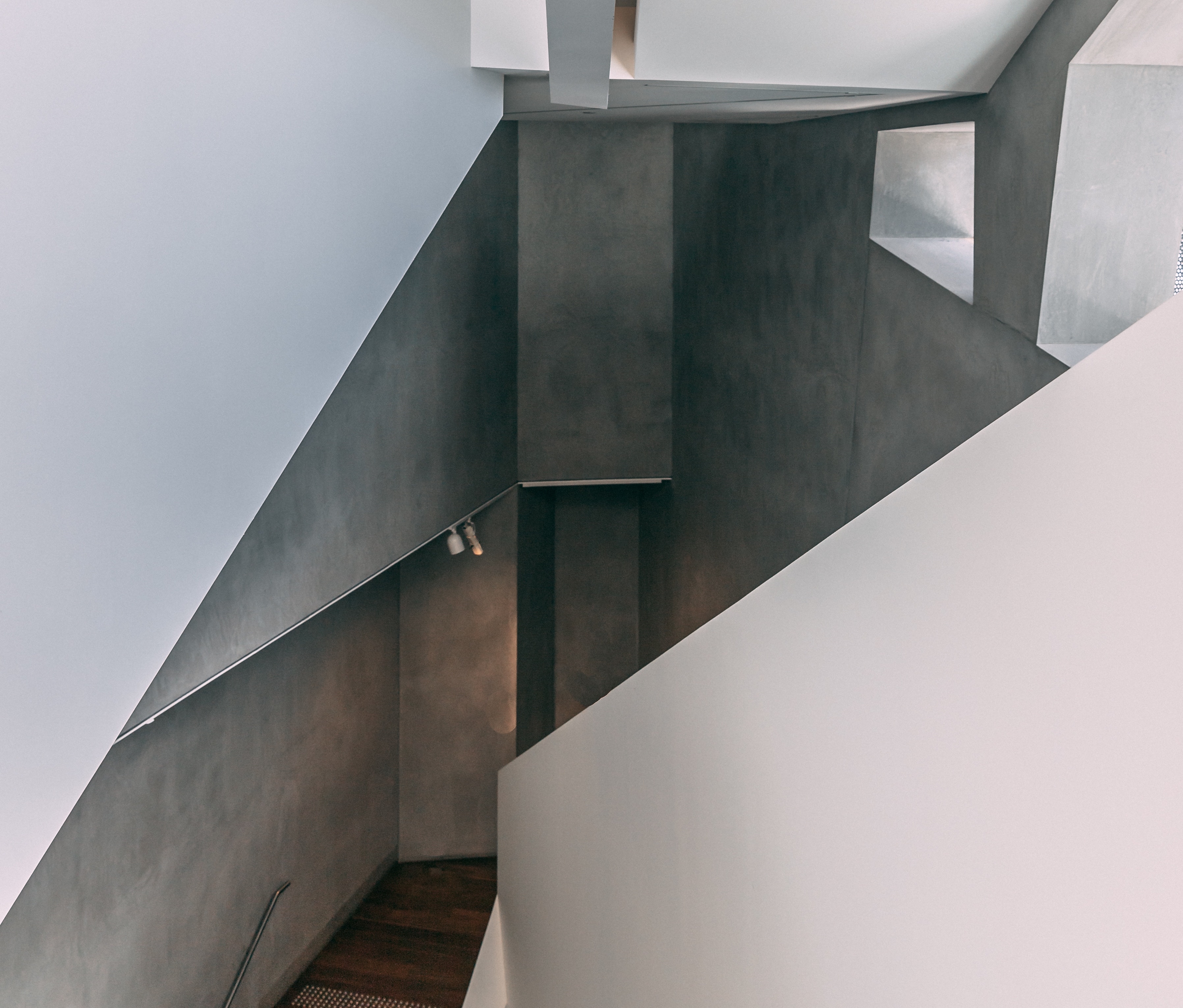 Concrete home interior | Photo: Unsplash/Kevin Xue