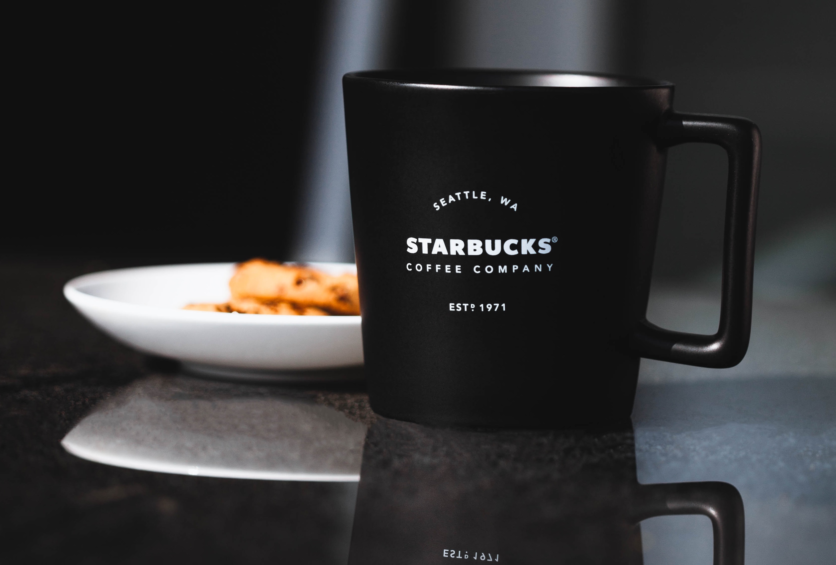 Starbucks coffee mug on a table