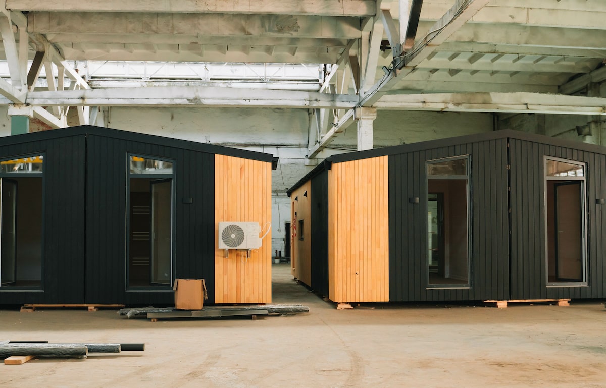 Off-site fabrication of modular houses in a factory