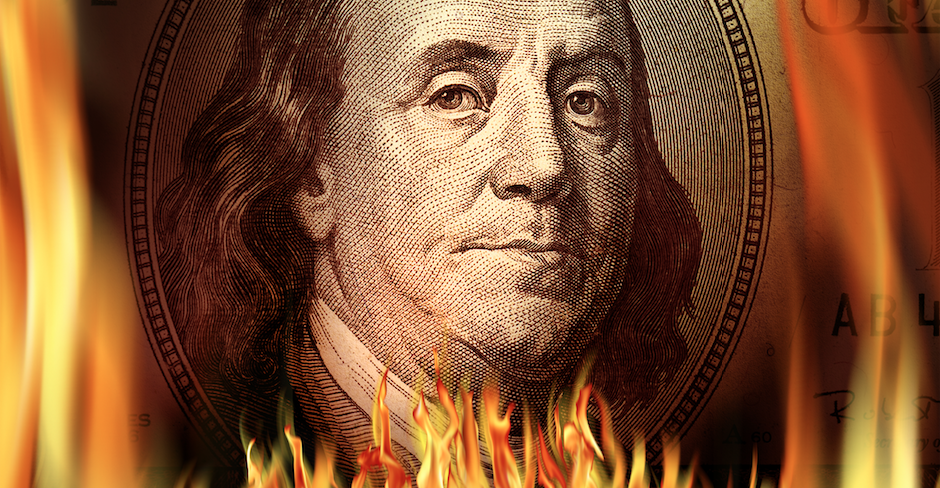 U.S. $100 on fire shows waste of money and profits burning
