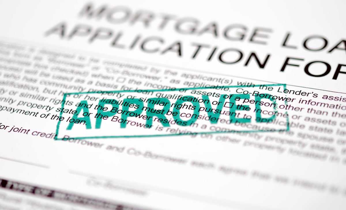 Approved stamp on mortgage loan application form