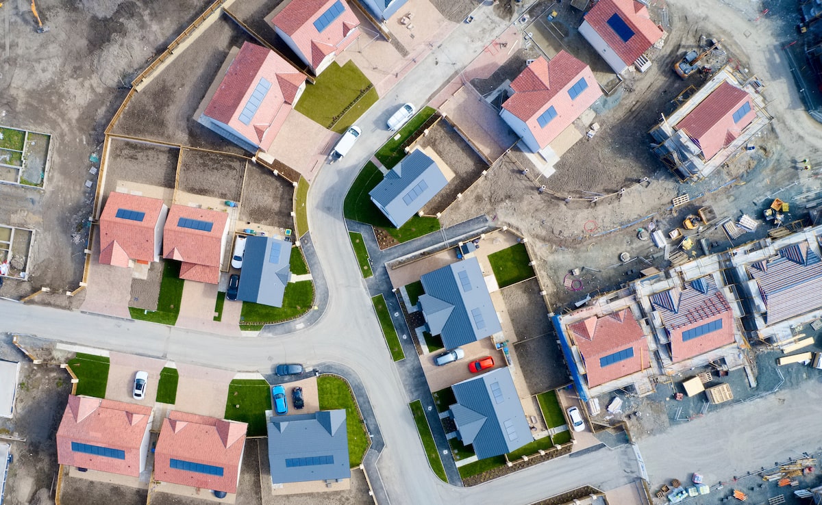 Aerial view of new houses under construction in residential neighborhood