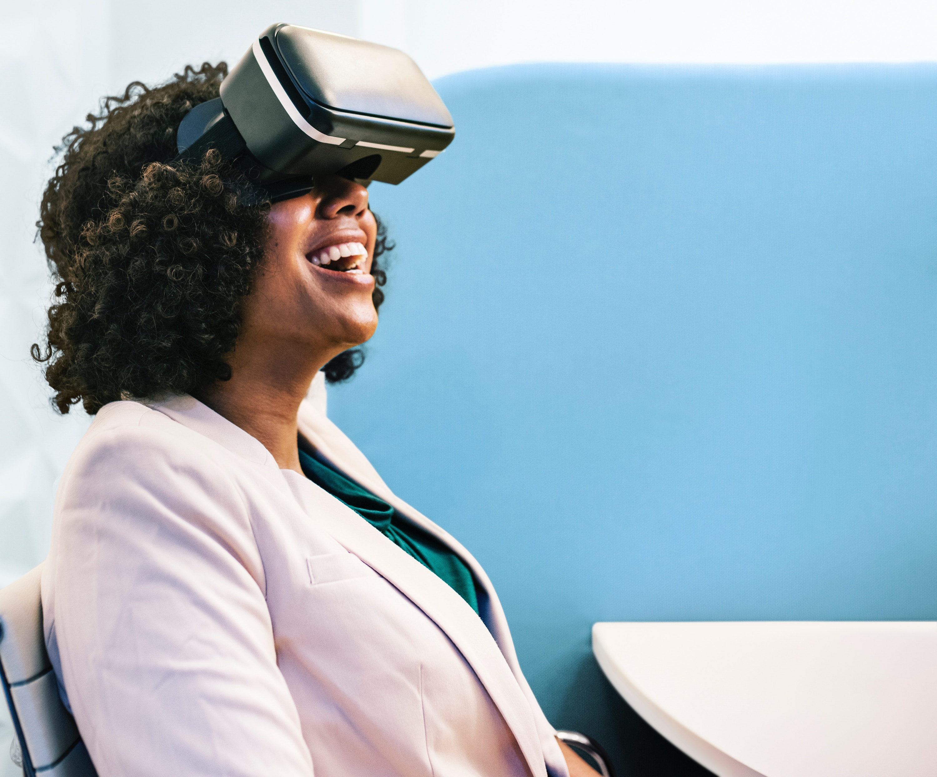 Woman sitting with VR headwear on