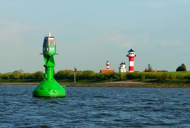 Bouy and light house in harbor