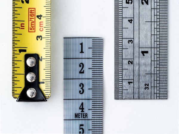 Three measuring tapes for measuring home size