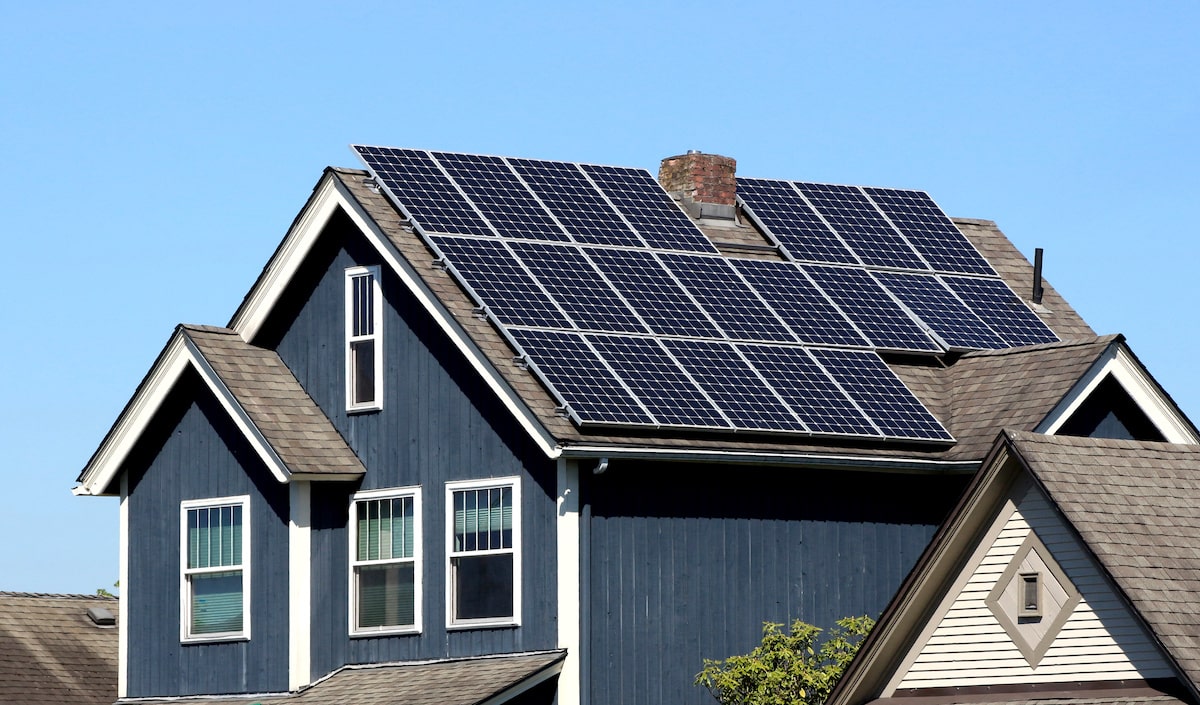 Solar panels on residential home rooftop power electrical systems in the home