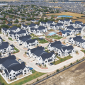 Aerial view of multifamily rental development Hermosa Village in Texas