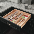 Spice drawer with dividers, photo courtesy KraftMaid