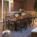 Outdoor living at Summerville includes a summer kitchen with outdoor dining and seating, as well as a hot tub.