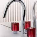 Designed by Remi Tessier, Beyond Crystal bath fittings add sparkle to the vanity with rectangular crystal handles in Baccarat colors. They are also offered with an optional LED system that enables the crystal to glow. The crystal is offered in clear, red, champagne, aqua and blue.